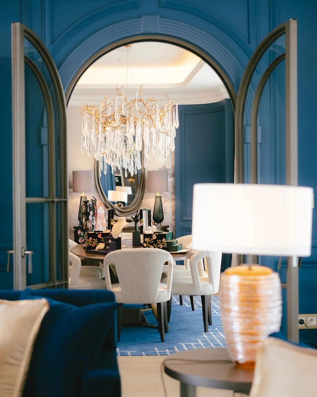 The Penthouse at the Corinthia Grand Hotel Astoria, seen through arched doors